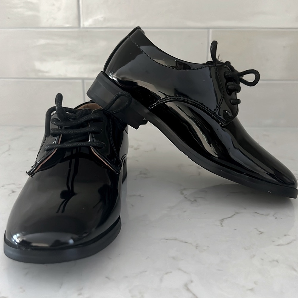 Tip Top Lito round toed Black patent leather shoe